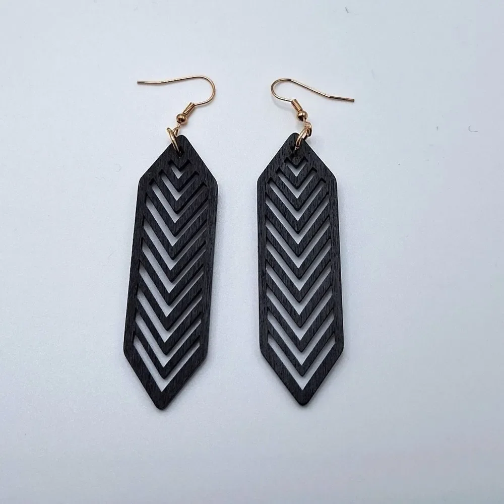 Black wood hollowed out earrings abstract